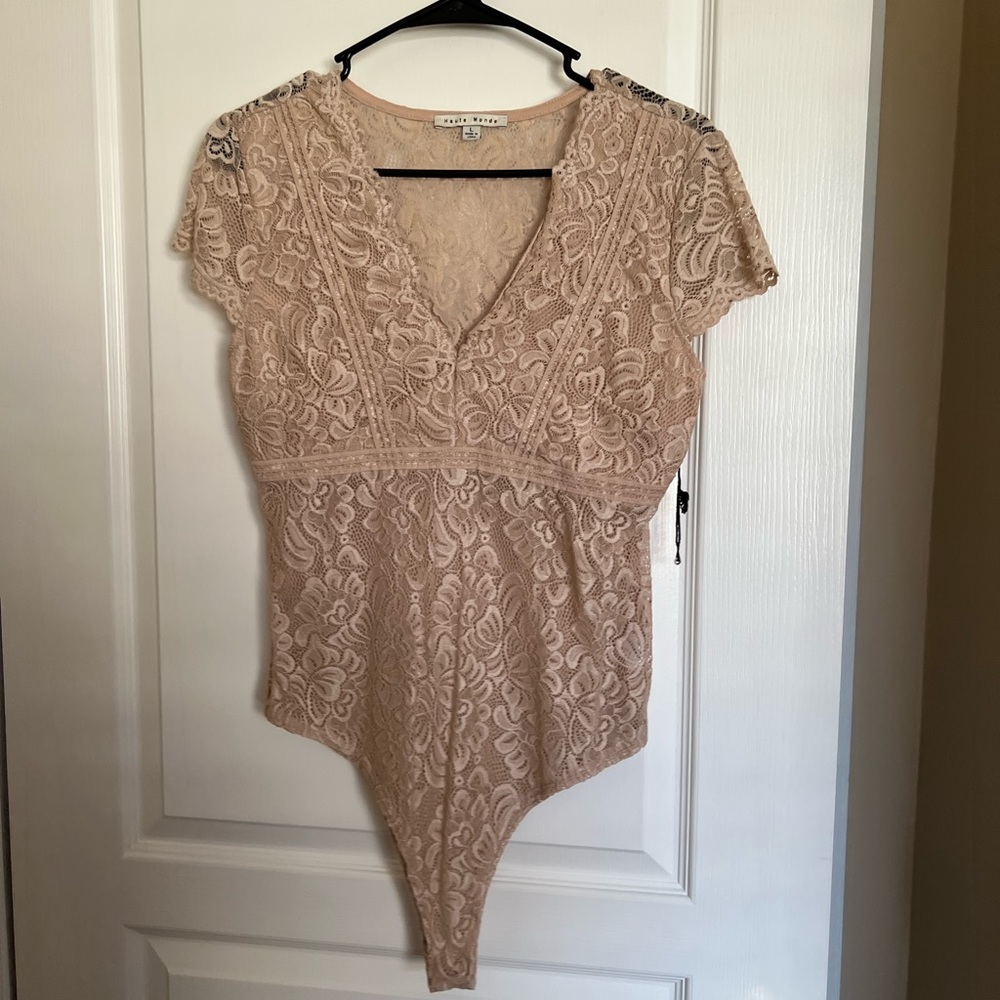 NWT lace body suit. L